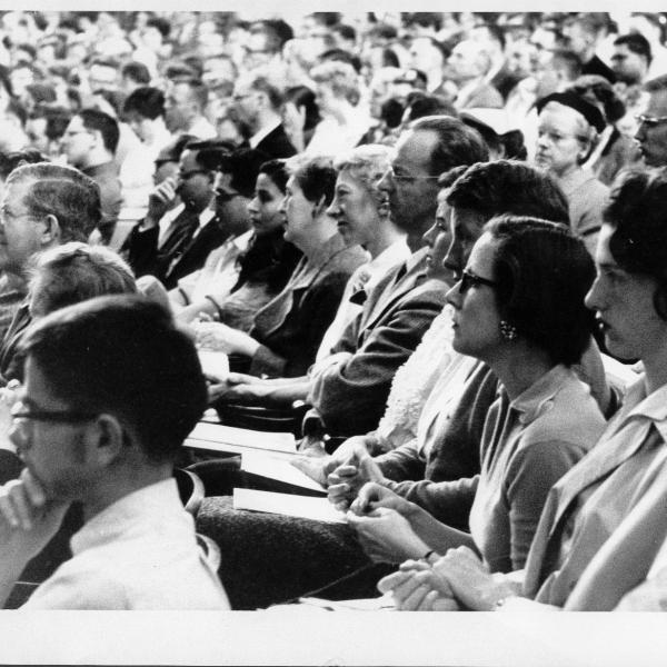 Students watch a CWA address in Macky Auditorium
