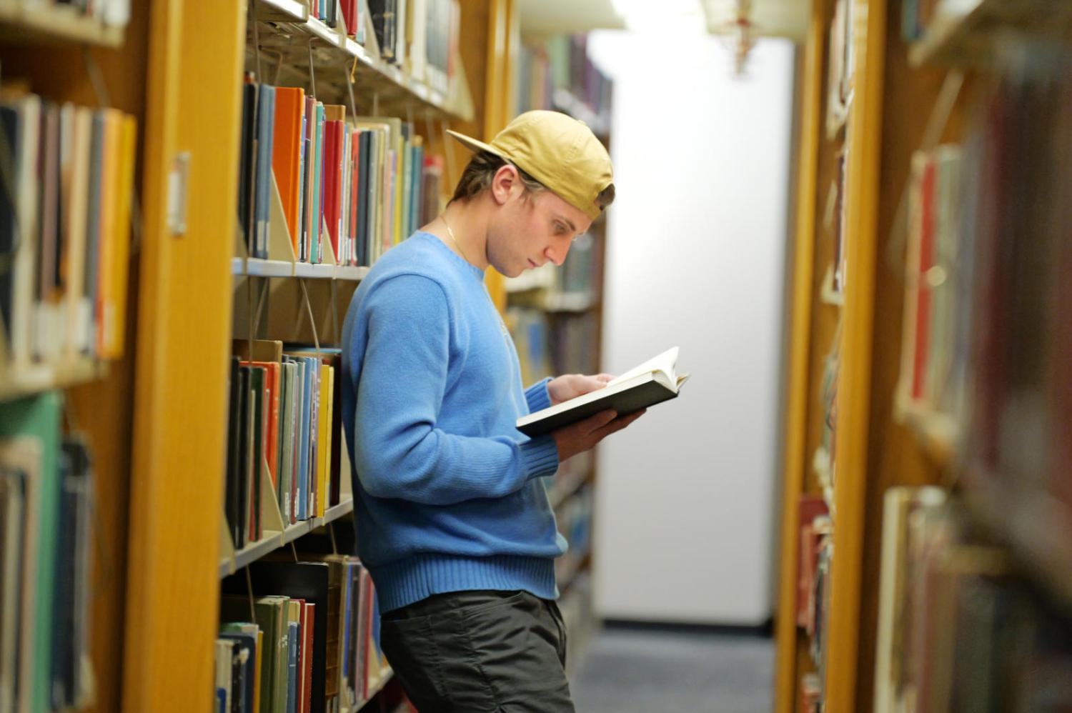student with a book