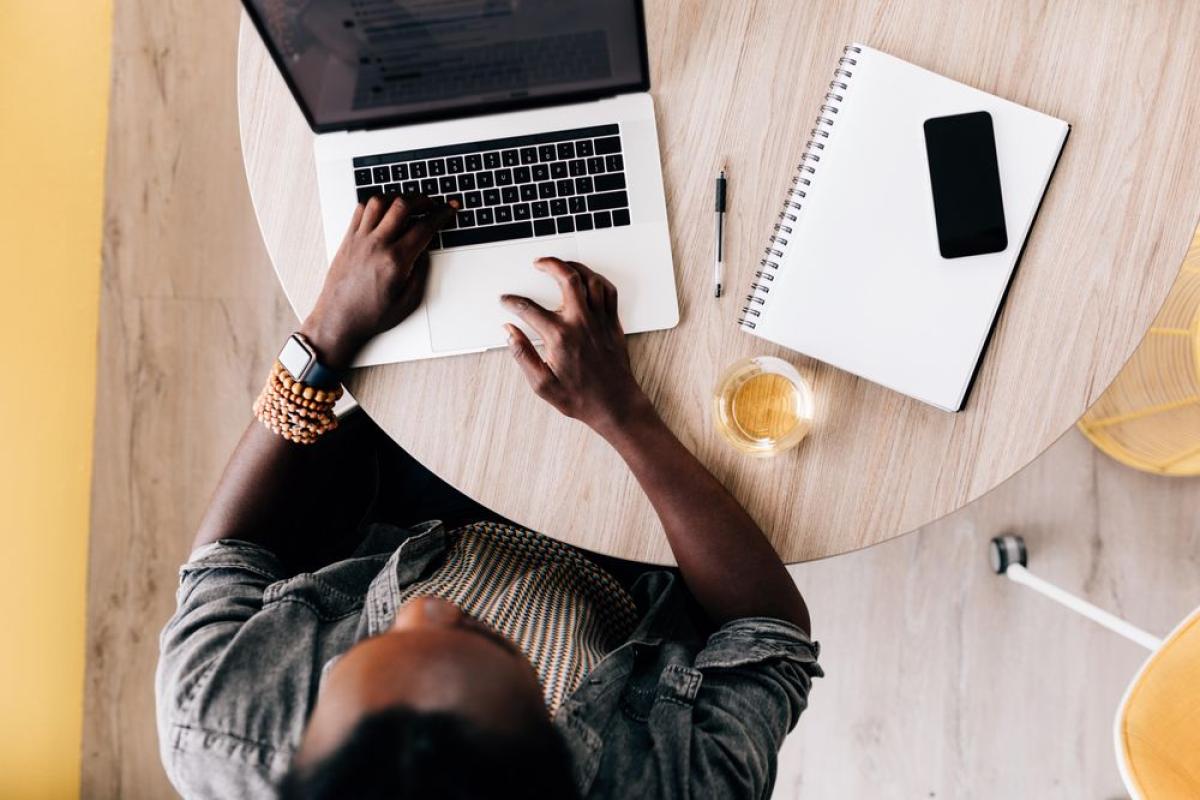 Aerial view of man working on laptop