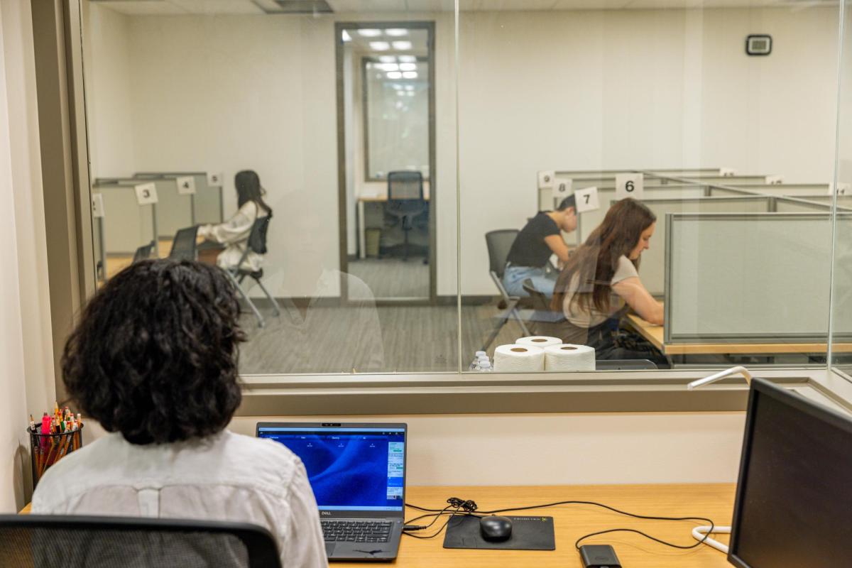 staff member proctoring an exam