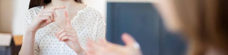 woman doing sign language