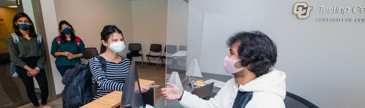 a student checking in to the testing center