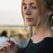 woman looking at her cell phone