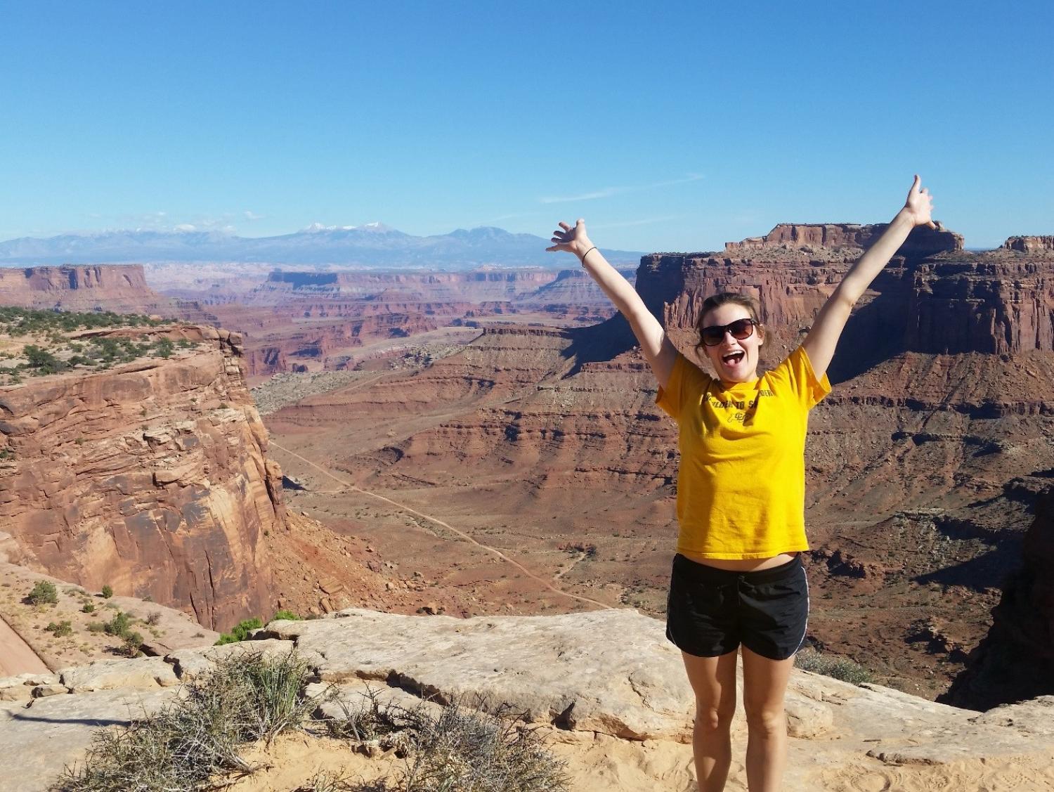 Hannah expressing herself in font of the grand canyon