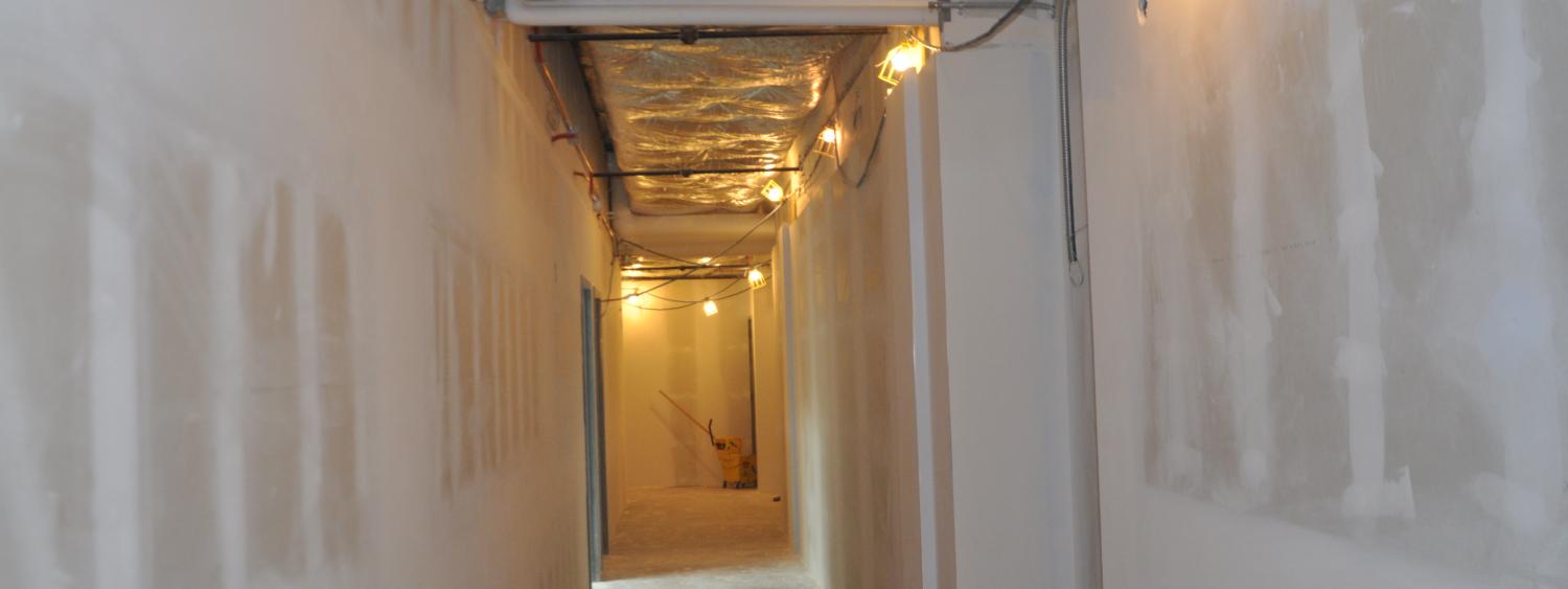 View of a hallway with finished drywall