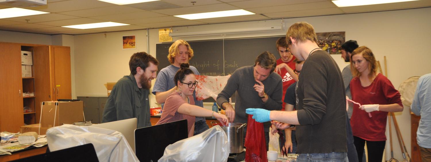 Students dyeing silk. 