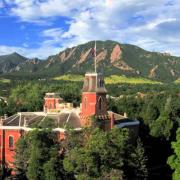 Old main building in front of the flatirons