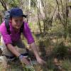 Thumbnail of Erin Polka working in the woods.