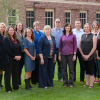 RIO faculty standing outside posing for a photograph