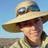 Abbey Paulson with hat in desert 