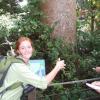 Anna Walker next to tree