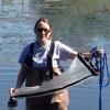 Elizabeth in water fishing for zooplankton