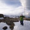 Researcher measuring snow in the alpine