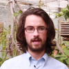 Collin talking in greenhouse