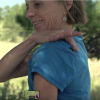 Carol Kerns with a honey bee on her back