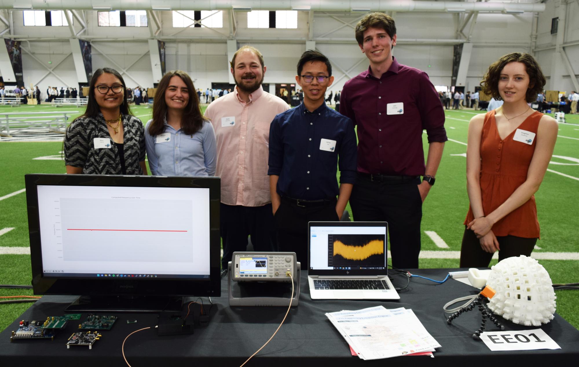 The six team members with their project at the Engineering Projects Expo