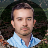 Jorge Poveda headshot overlayed on an aerial view of campus