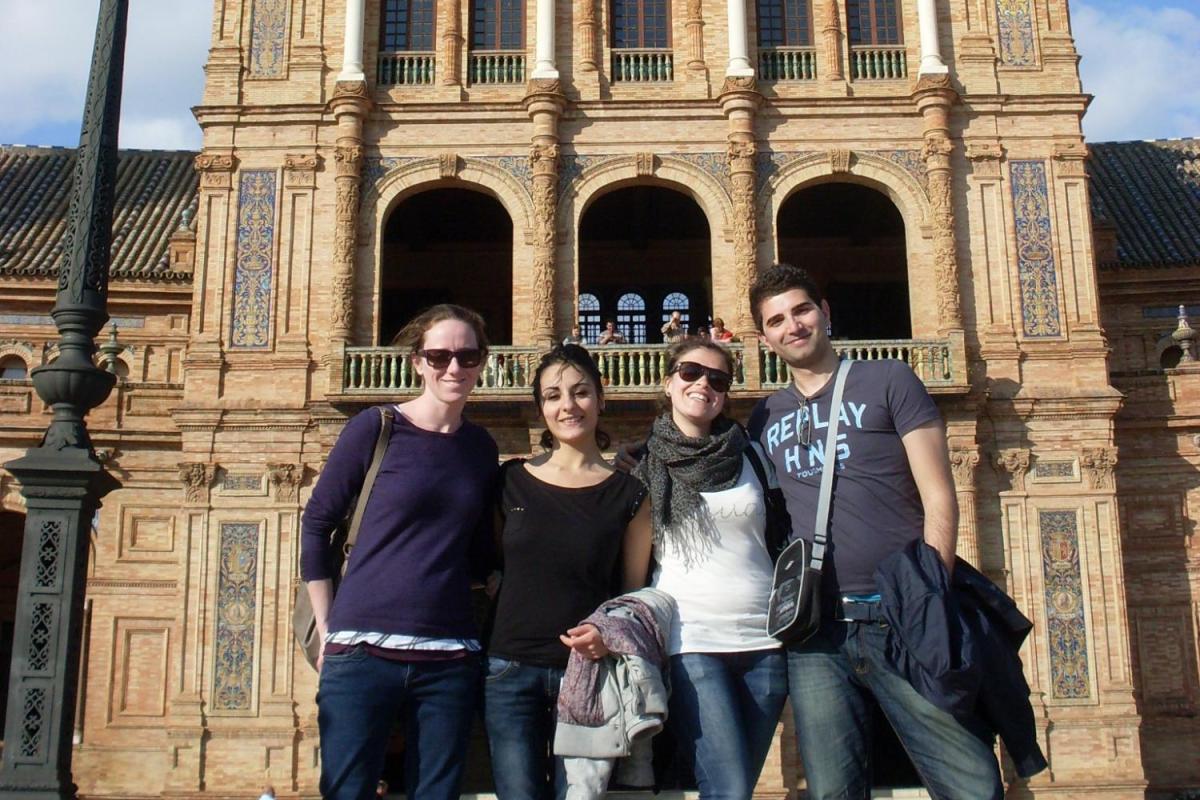 A group of students poses in the Plaza Espana in Seville, Spain.