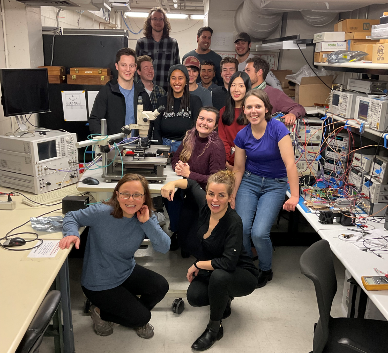 Popovic and a few of her graduate students pose for a group photo in their lab