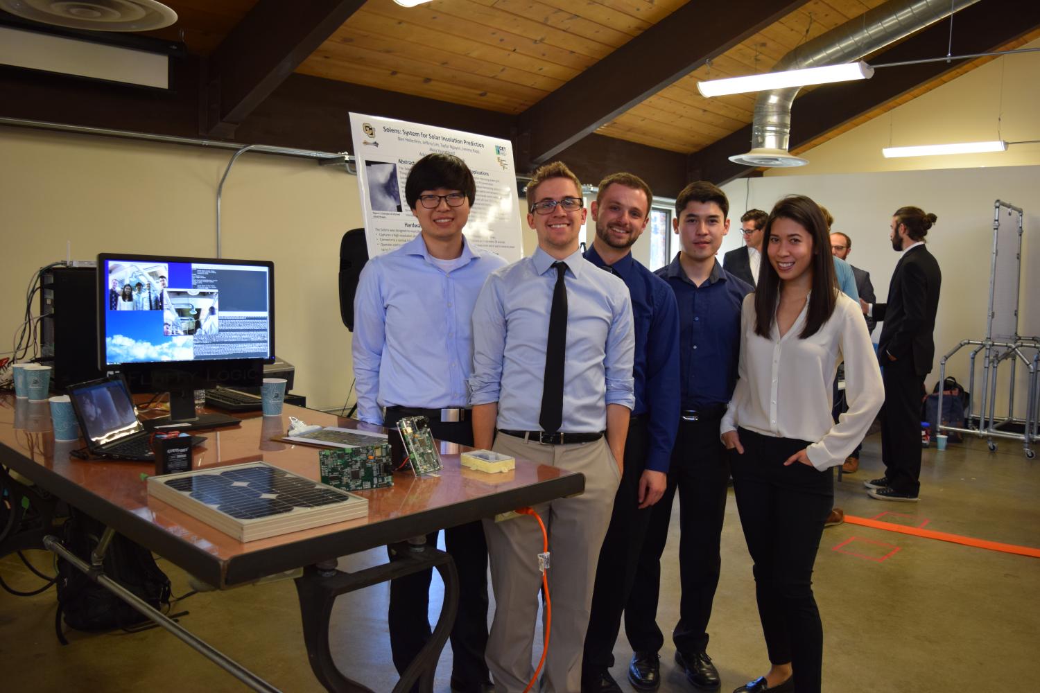 The five members of Fluffy Logic at the 2017 Senior Design Expo.