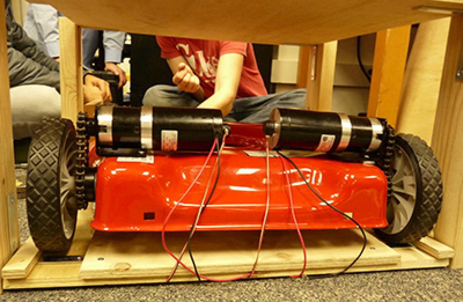 The Mow-Bot sits in its charging station