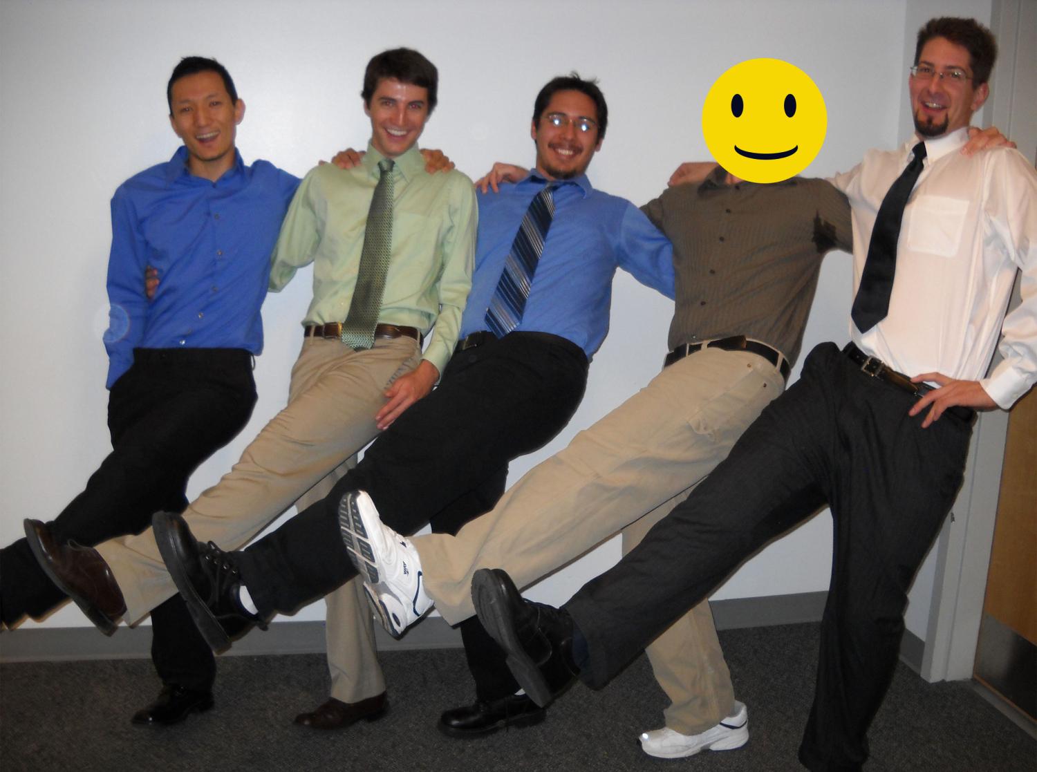 The five members of Power Blocks performing a kick line