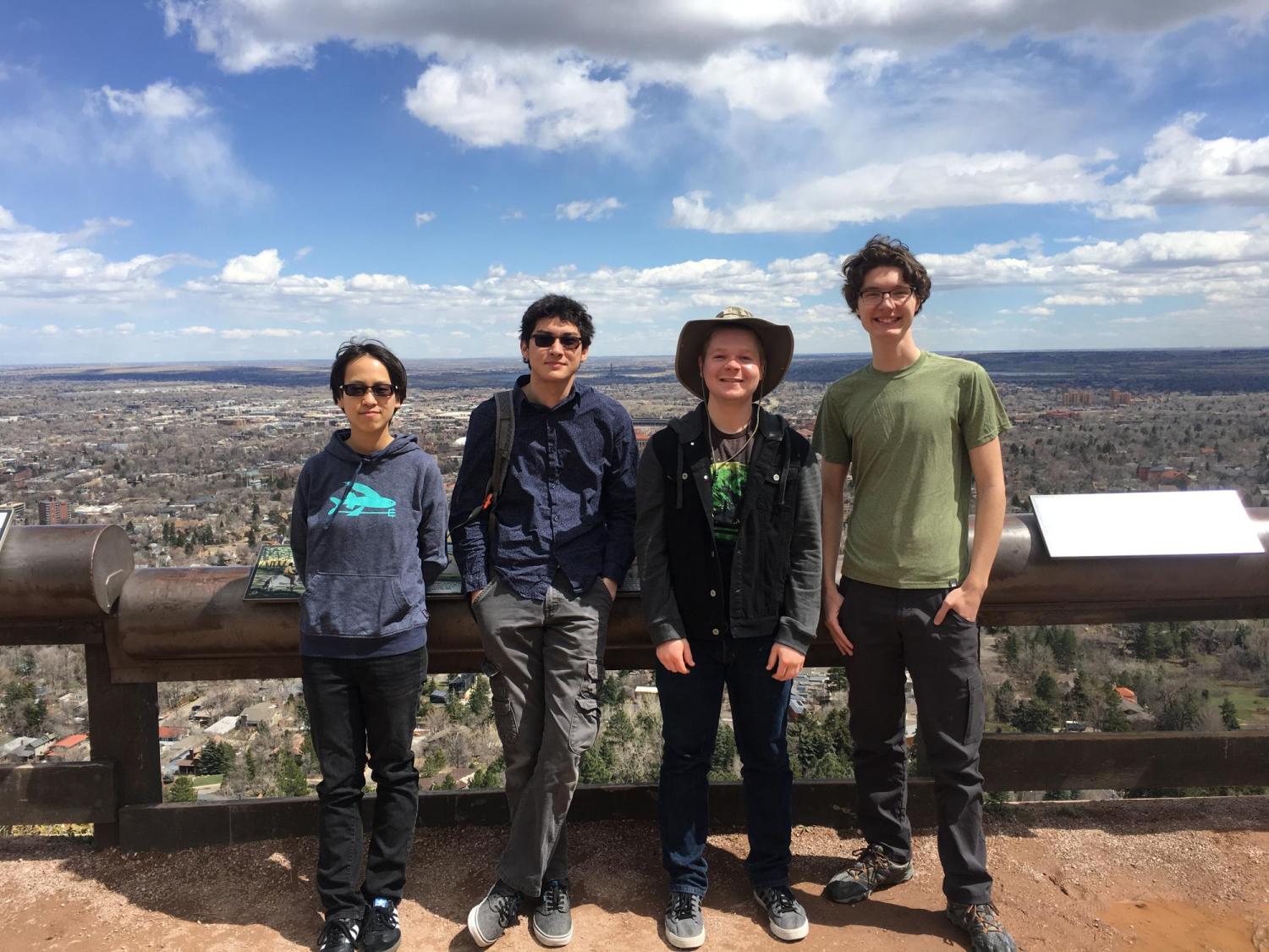 The team at a scenic overlook during a team-building outing