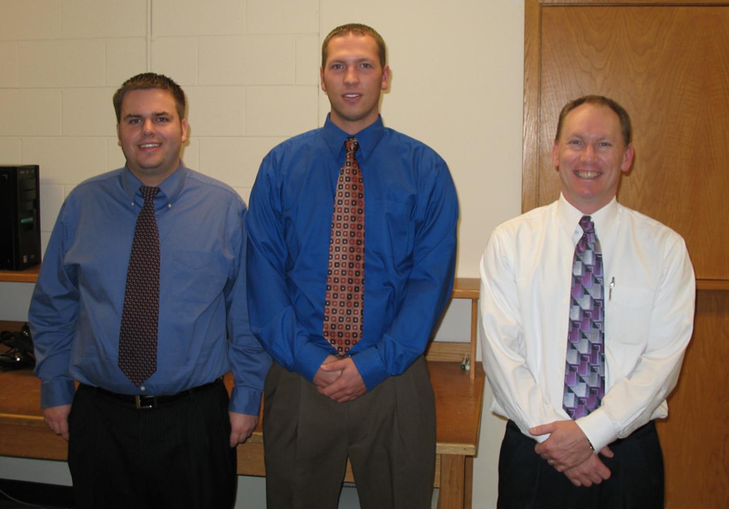 The three members of Vigilant