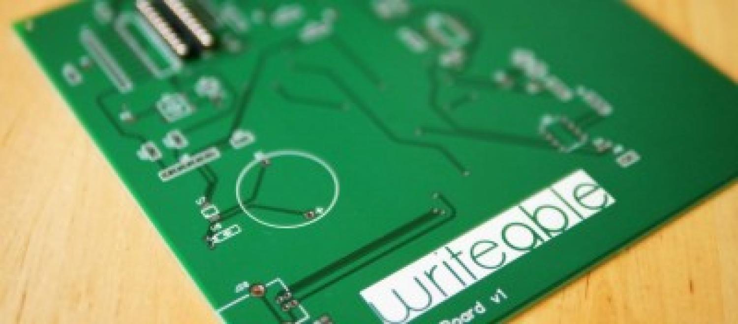 A circuit board bearing the WriteAble logo.