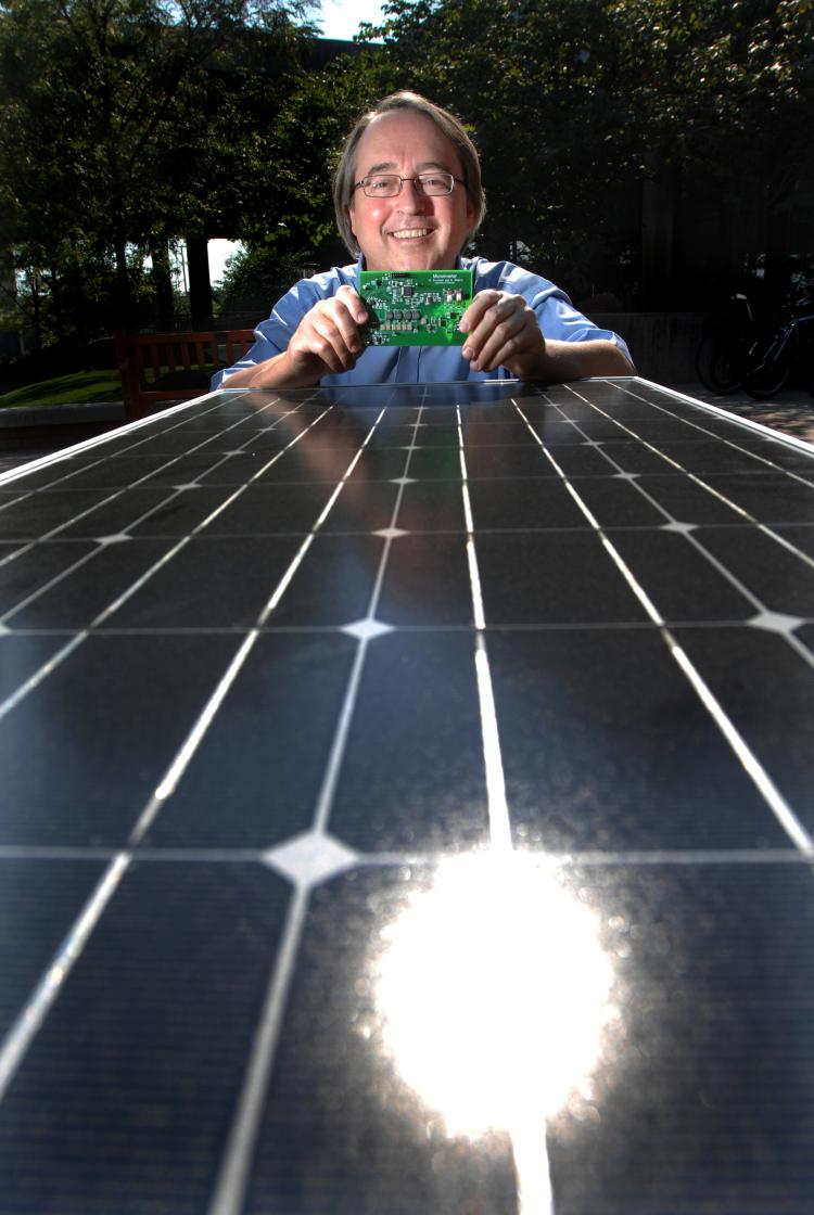 Robert Erickson with solar panel