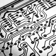 Detail image of a circuit board, in black and white. 