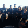 The Stateless team toasts to their new funding. 