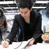Dimitra Psychogiou works with two students in the ECEE circuits lab.