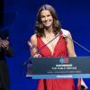 Higgins speaks after receiving her medal on stage at the Kennedy Center