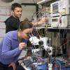 Zoya Popovic looking in microscope