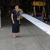 Lucy Pao with one of the blades at NREL.