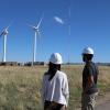 Pao (left) and her team members look at test turbines at NREL