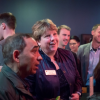 Fiez chats with fellow attendees at the 2019 New Venture Challenge Finals at the Boulder Theater.