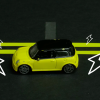 An illustration of a car traveling down the "charging lane" of a highway.