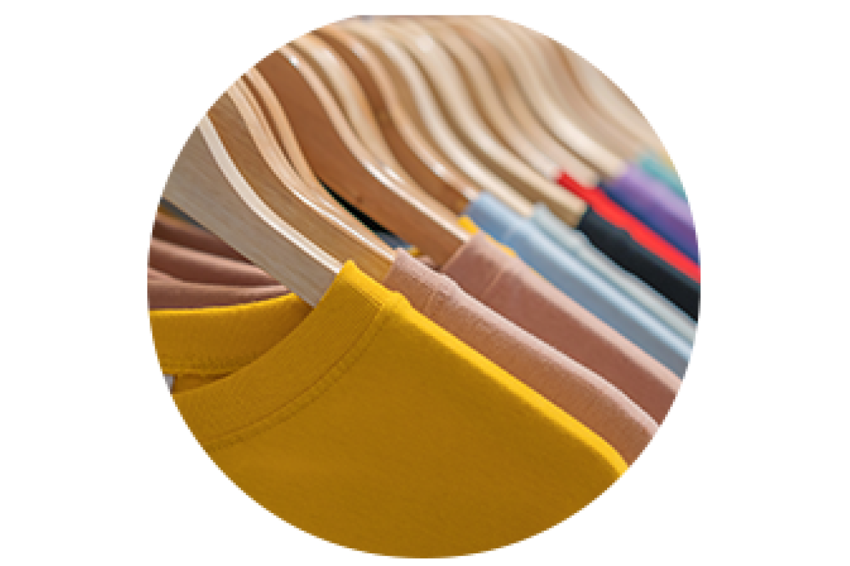 A rack of different colored shirts