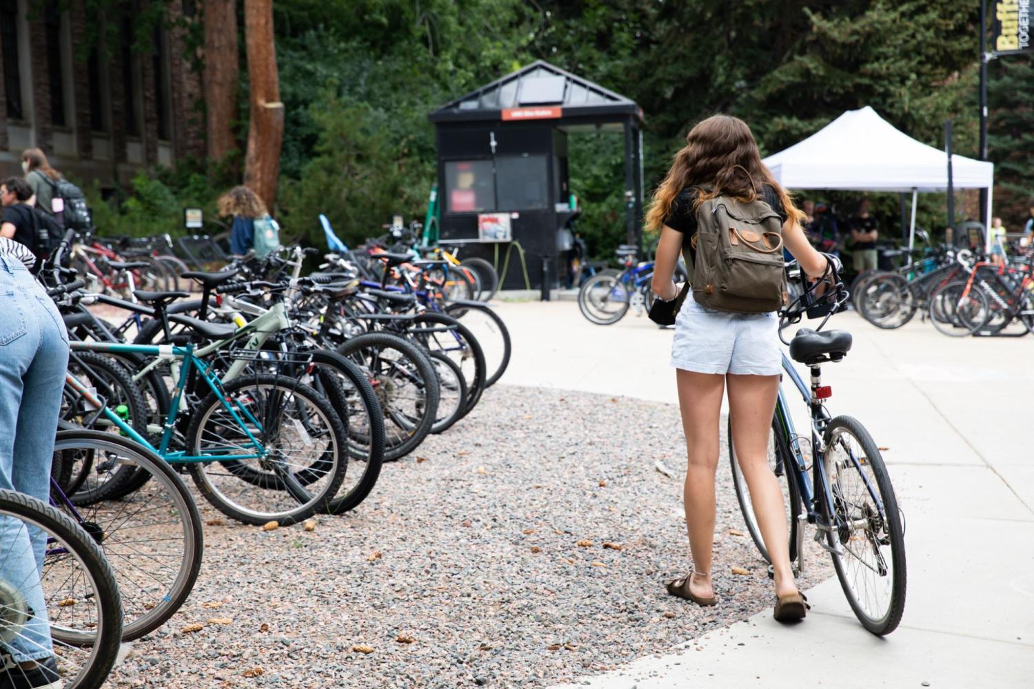 student near bike racks
