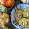 pumpkins and squash on a table