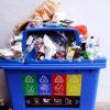 recycling bin overflowing with trash