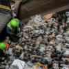 sorting plastic at recycling plant