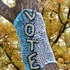 tree with vote scarf around it