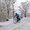 man biking in snow