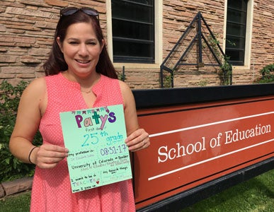 Paty in front of the School of Education