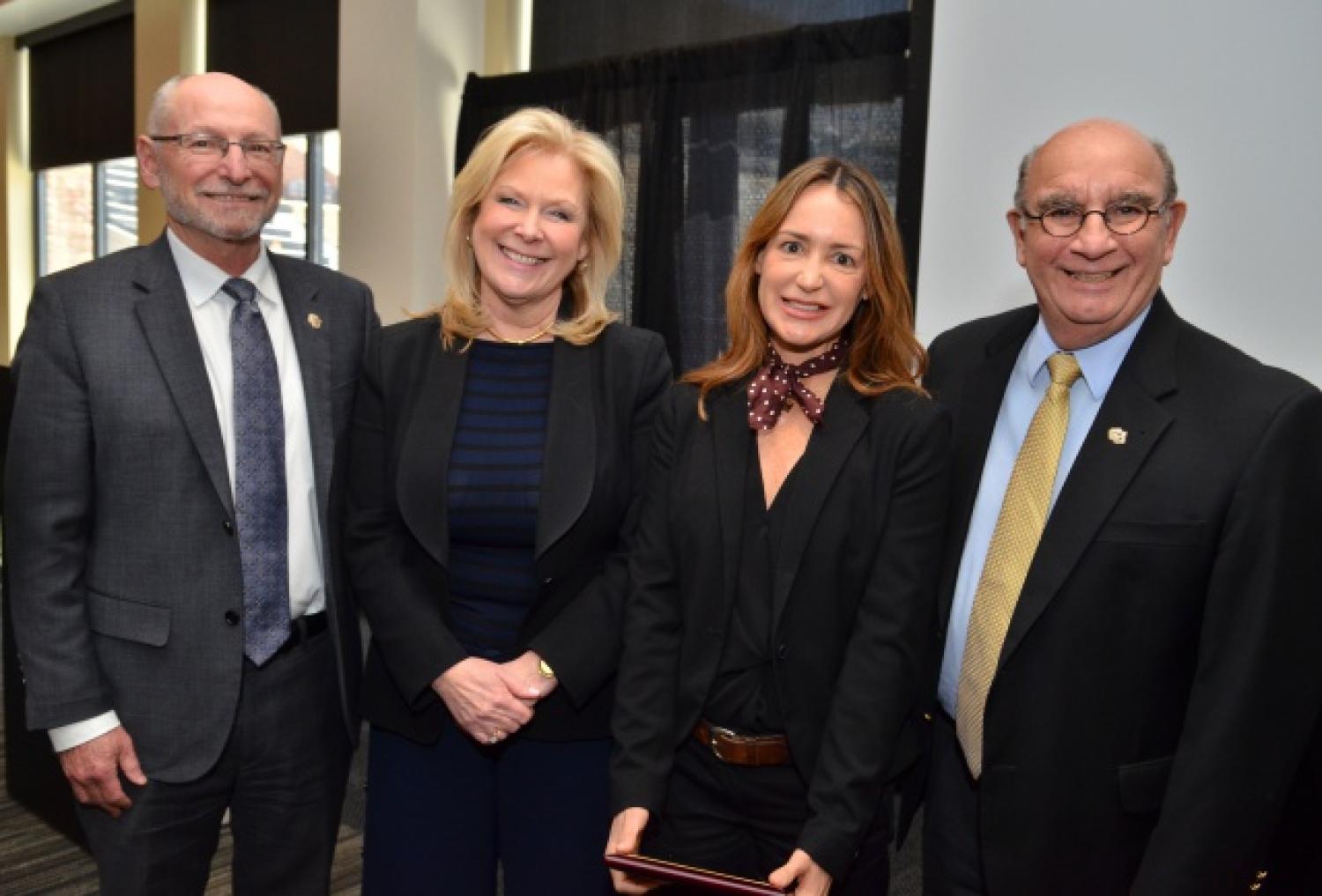 Pilar Prostko outreach award