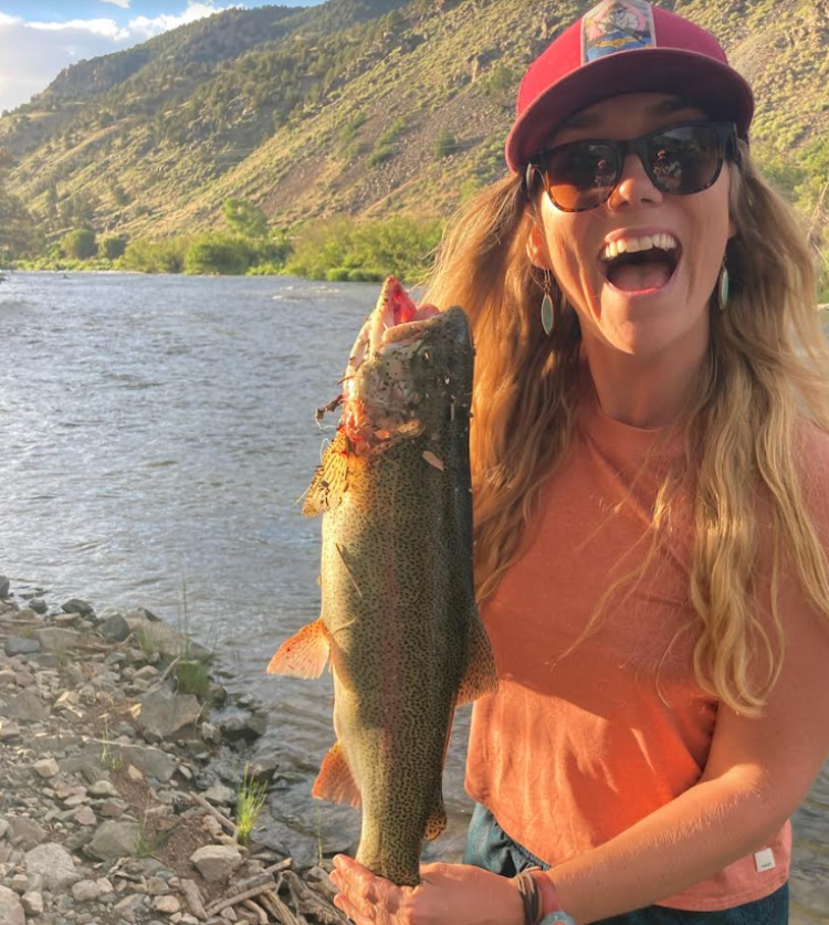 Loraine Glidewell holding a trout in the Arkansas River