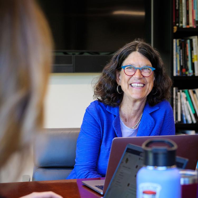 Dean Kathy Schultz in a meeting